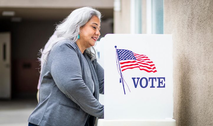 A woman at a voting booth in Albuquerque.